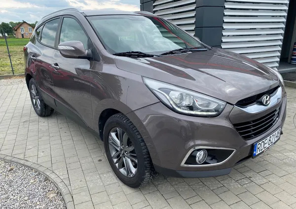 samochody osobowe Hyundai ix35 cena 49999 przebieg: 180000, rok produkcji 2014 z Racibórz